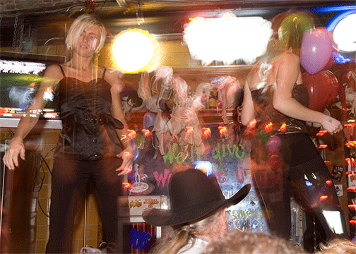 picture of Girls dancing on bar inside Beale St. bar